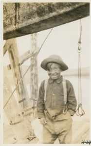 Image: Eskimo boy on dock